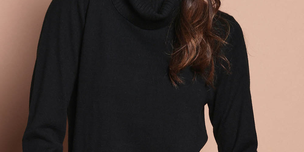 Model Amanda wearing size S of The Keepers Soft Roll Neck Jumper in colour Black (Black), from the front, cropped image