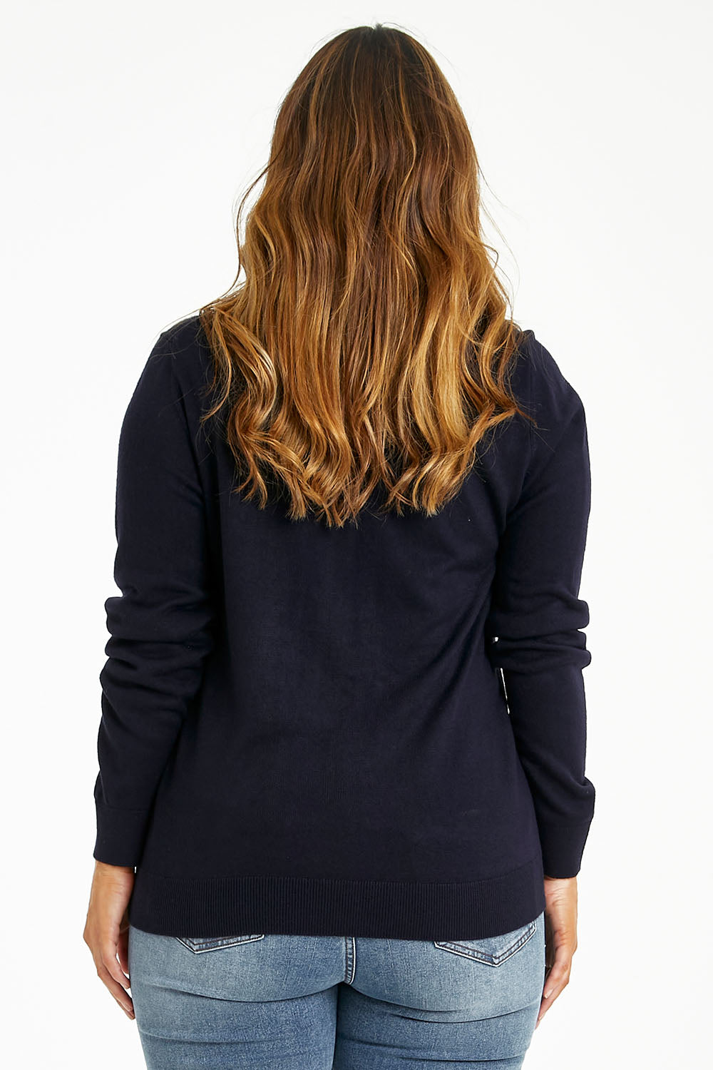 Model Laura wearing size L of The Keepers Soft Roll Neck Jumper in colour Darknavy (Blue), from the back