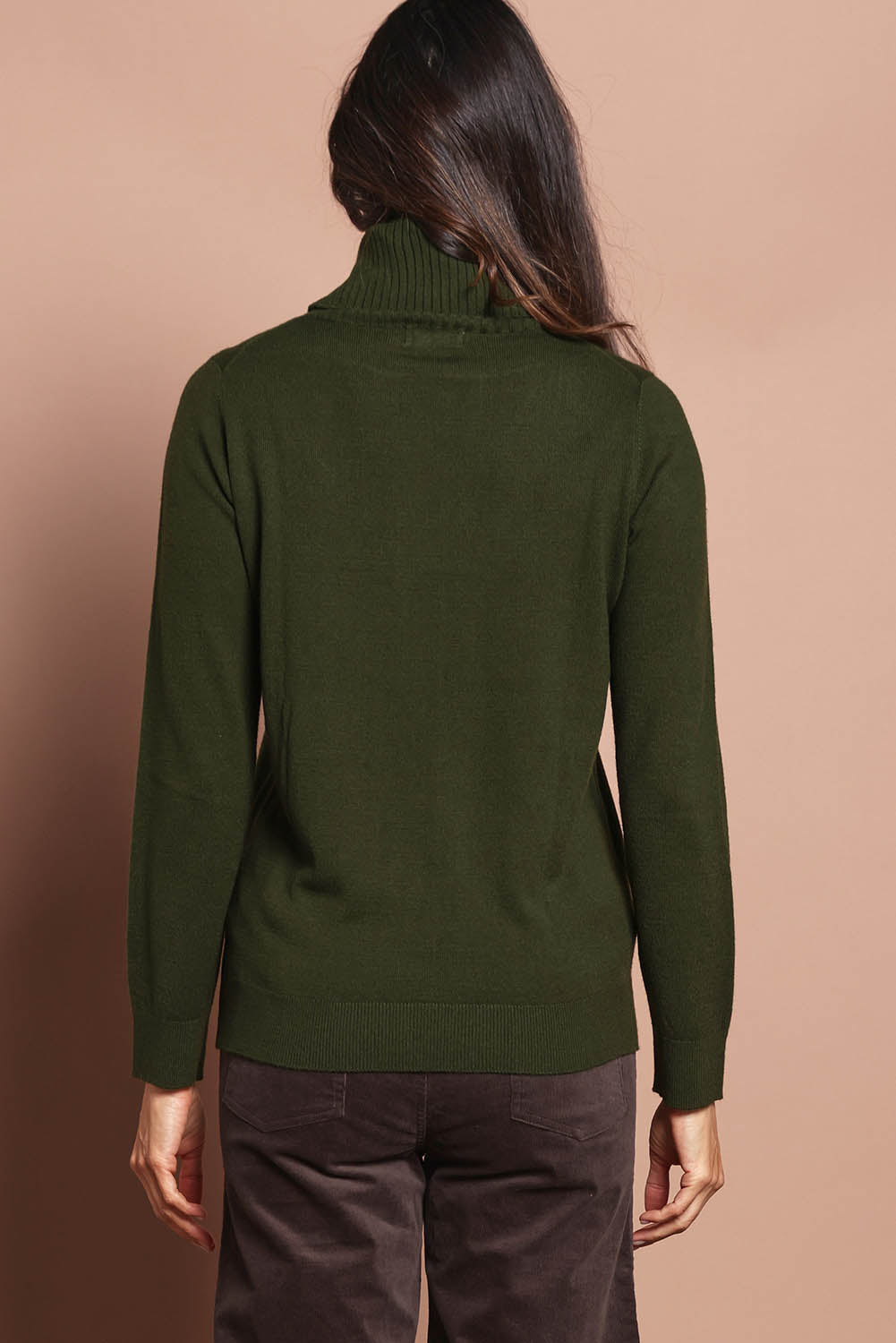 Model Amanda wearing size S of The Keepers Soft Roll Neck Jumper in colour Darkolive (Green), from the back
