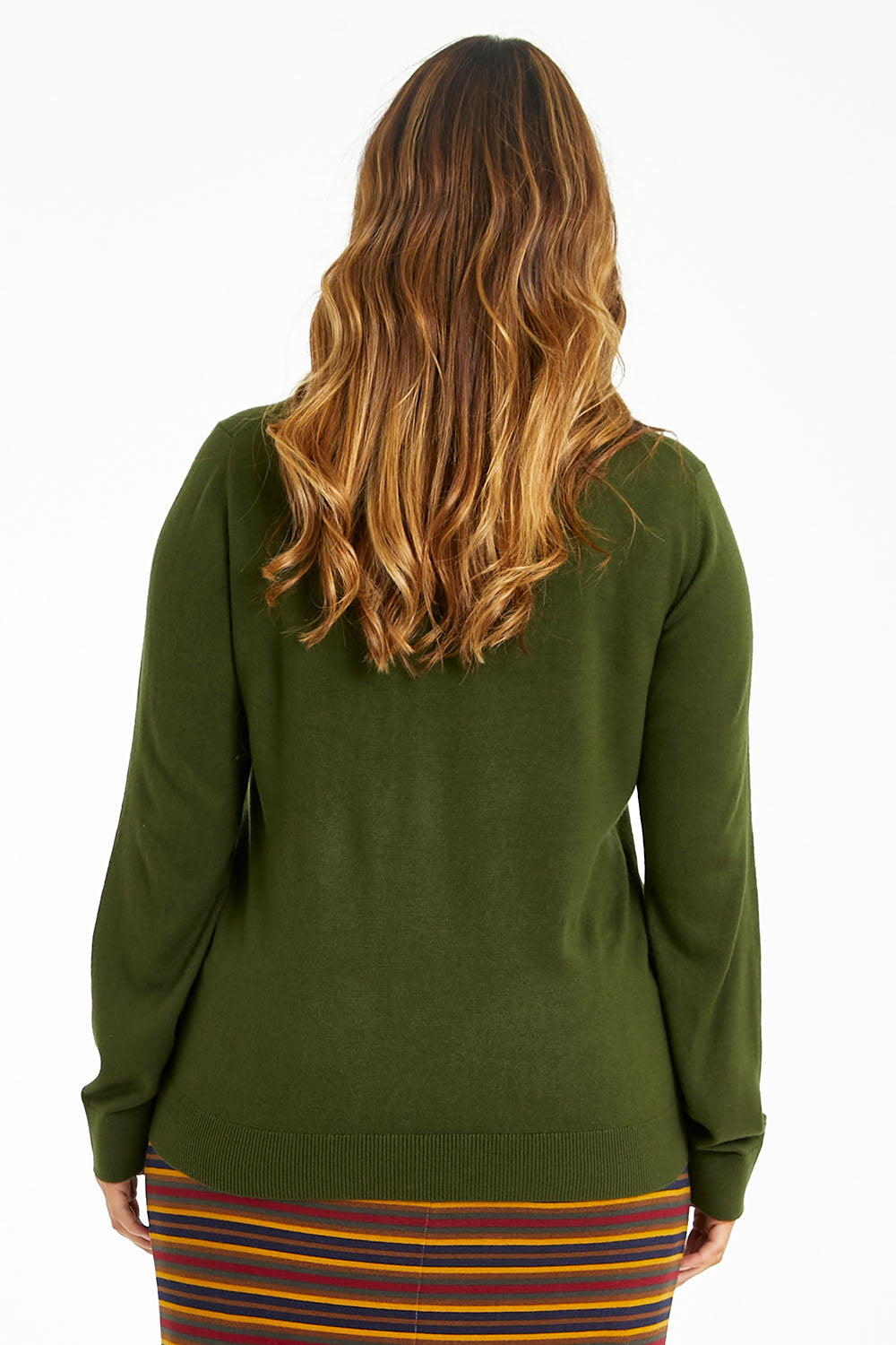 Model Laura wearing size L of The Keepers Soft Roll Neck Jumper in colour Darkolive (Green), from the back
