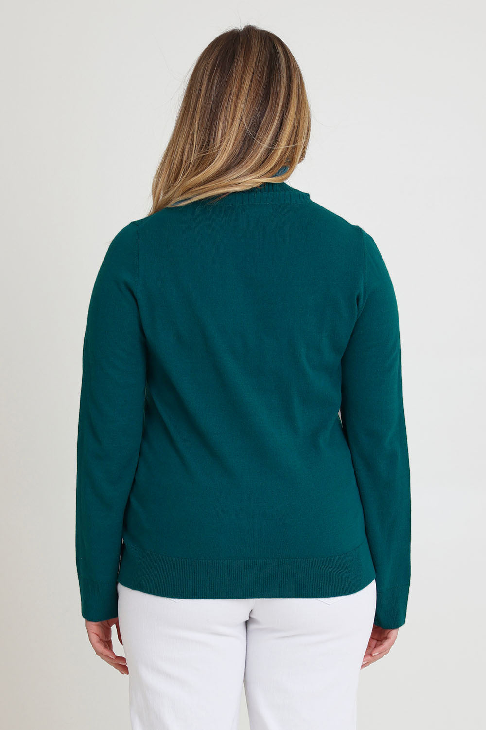 Model Chanel wearing size XL of The Keepers Soft Roll Neck Jumper in colour Turquoise (Green), from the back