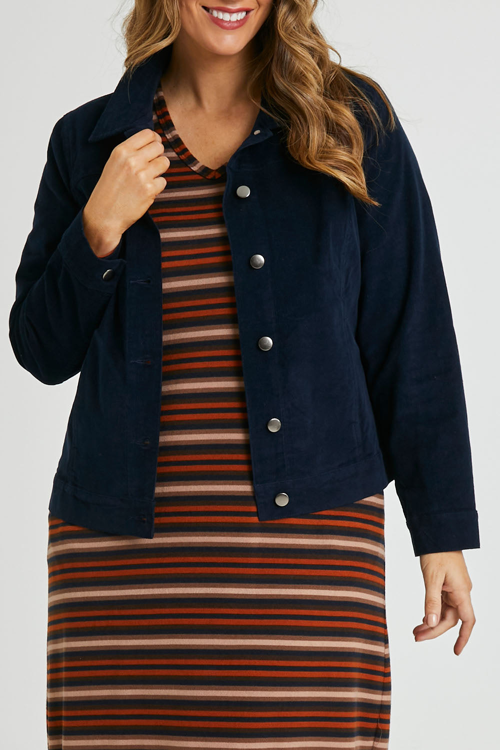 Model Laura wearing size 14 of The Cord Casual Jacket in colour Navy (Blue), from the front, cropped image