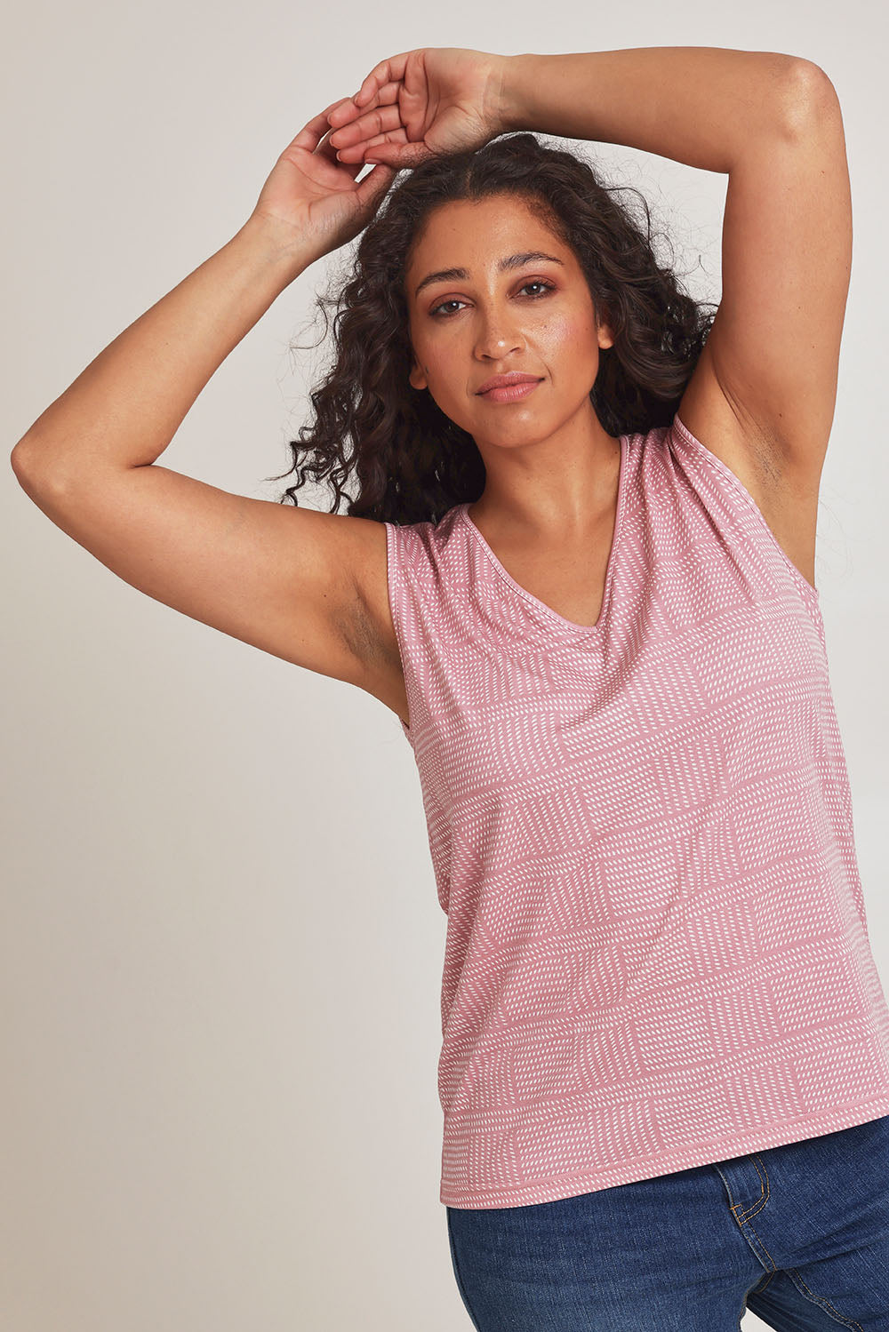 Model Terri-Leigh wearing size 14 of The Printed Bamboo Blend V Tank in colour Pinkblush (Pink), from the front, cropped image