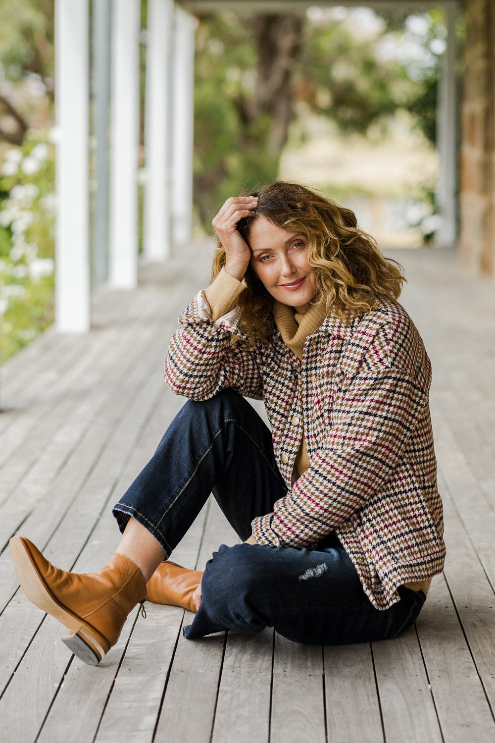 Model Emma wearing size 10 of The Houndstooth Bomber Jacket in colour Multicheck, from the front, showing the whole outfit