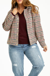 Model Laura wearing size 14 of The Houndstooth Bomber Jacket in colour Multicheck, from the front, cropped image