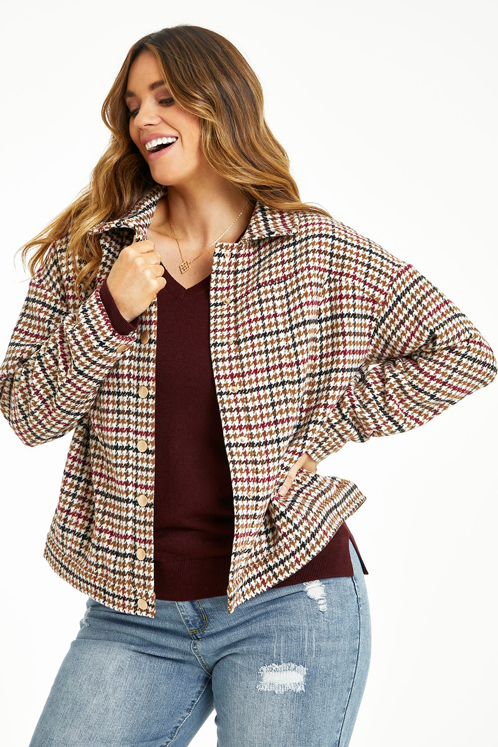 Model Laura wearing size 14 of The Houndstooth Bomber Jacket in colour Multicheck, from the front, cropped image