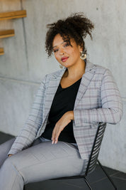 Model Alexis wearing size 18 of The Classic Check Blazer in colour Greycheck (Grey), from the front, showing the whole outfit
