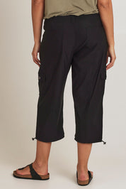 Model Terri-Leigh wearing size 14 of The Everyday Cropped Cargo Pant in colour Black (Black), from the back