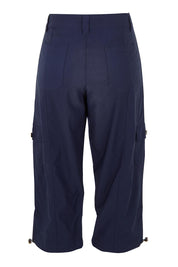 Product shot of The Everyday Cropped Cargo Pant in colour Darknavy (Blue), from the back
