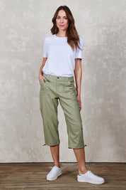 Model Madeline wearing size 10 of The Everyday Cropped Cargo Pant in colour Khaki (Green), from the front, showing the whole outfit