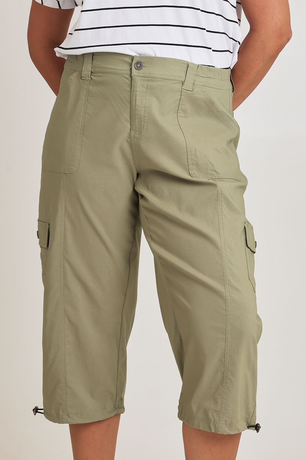 Model Terri-Leigh wearing size 14 of The Everyday Cropped Cargo Pant in colour Khaki (Green), from the front, cropped image