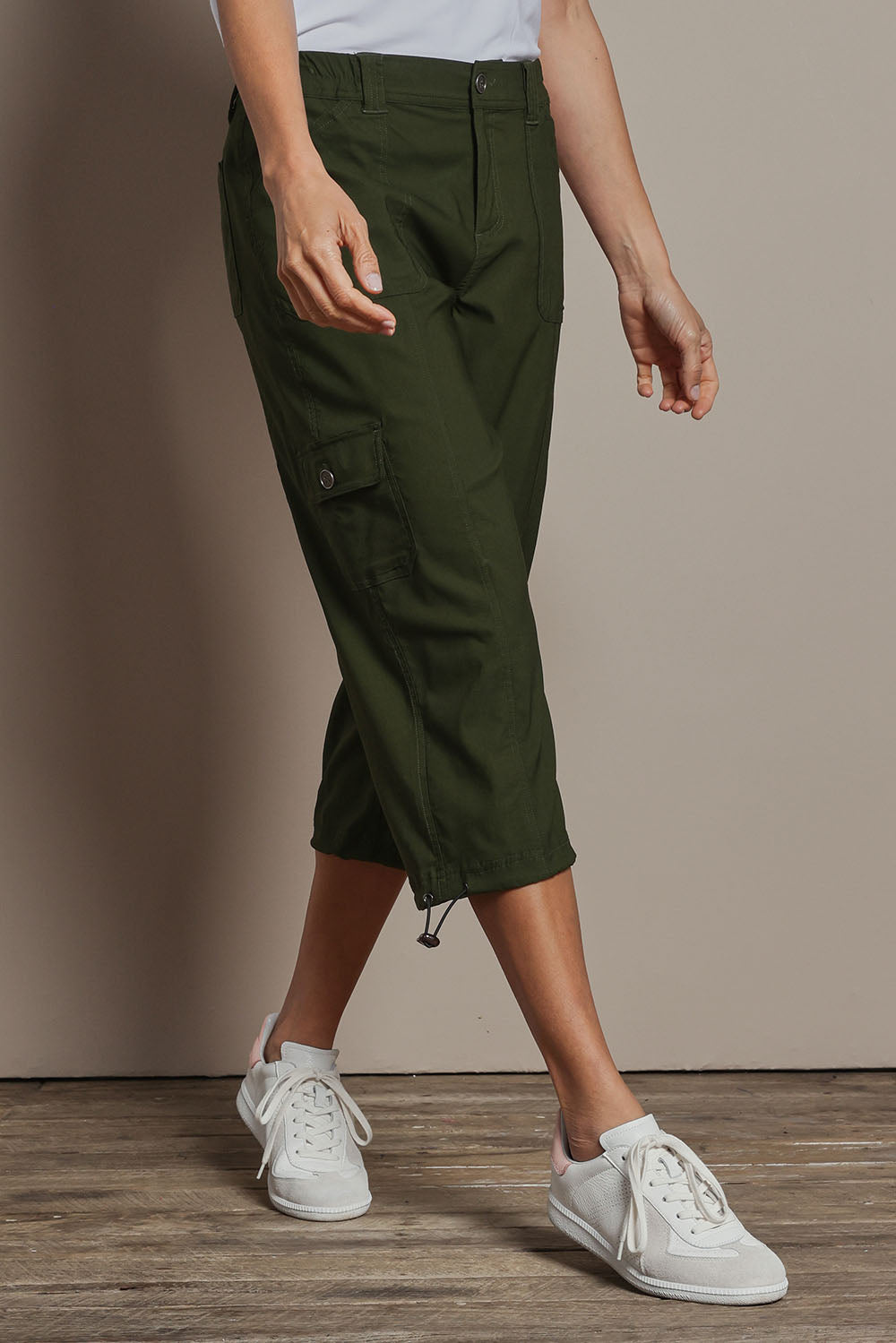 Model Amanda wearing size 10 of The Everyday Cropped Cargo Pant in colour Olive (Green), from the front, cropped image