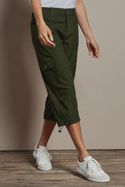 Model Amanda wearing size 10 of The Everyday Cropped Cargo Pant in colour Olive (Green), from the front, cropped image