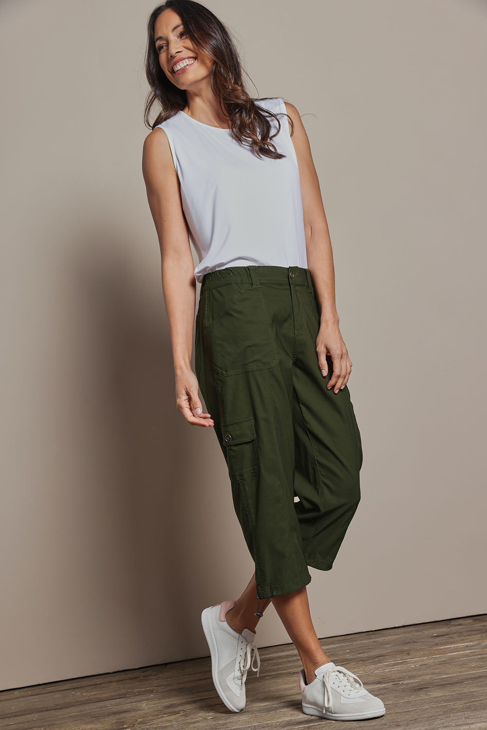 Model Amanda wearing size 10 of The Everyday Cropped Cargo Pant in colour Olive (Green), from the front, showing the whole outfit