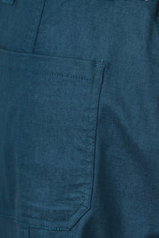 Product shot of The Everyday Cropped Cargo Pant in colour Petrol (Blue), detail