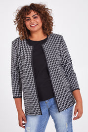 Model Anucia wearing size 14 of The Edge To Edge Ponte Print Jacket in colour Blackwhite (Black), from the front, cropped image