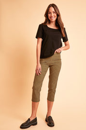 Model Madeline wearing size 10 of The Check Pull On Pant in colour Navytan (Blue), from the front, showing the whole outfit