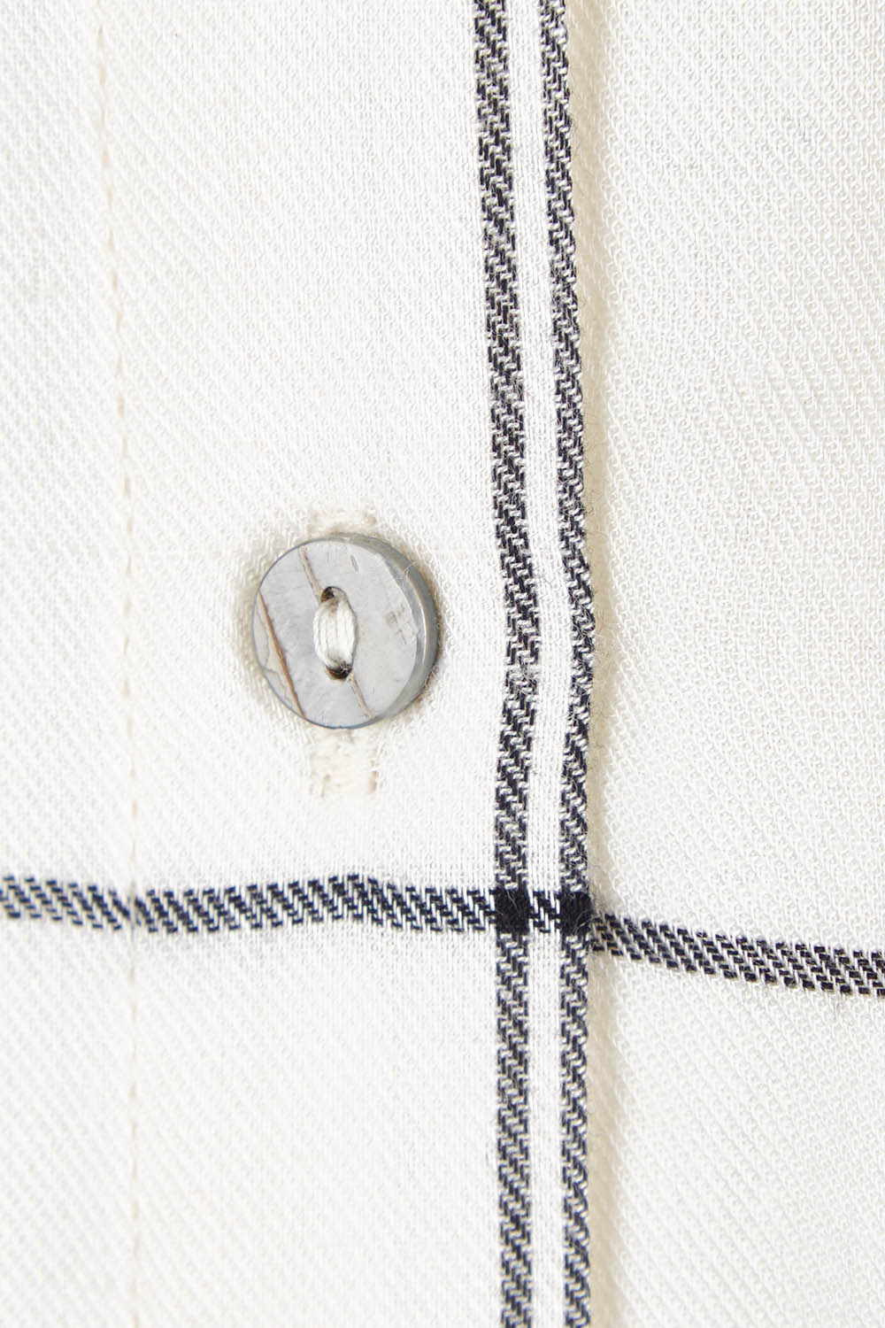 Product shot of The Keepers Relax Fit Top in colour Ivorygrey (White), detail