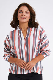 Model Monique wearing size 14 of The Nehru Collar Easy Wear Top in colour Multistrip (Black), from the front, cropped image