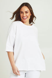 Model Jane wearing size 14 of The Keepers Elbow Length Tee in colour White (White), from the front, cropped image