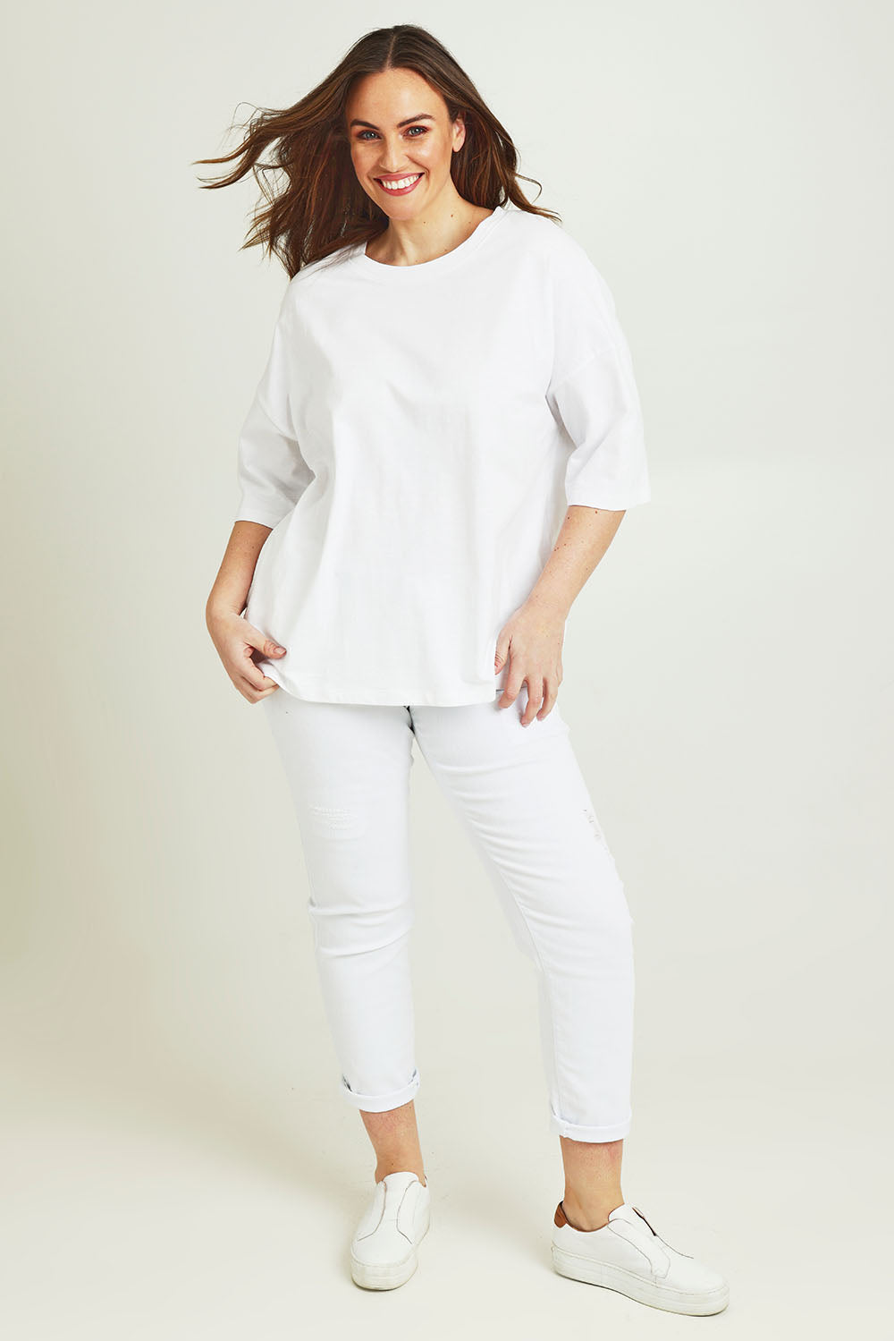 Model Jane wearing size 14 of The Keepers Elbow Length Tee in colour White (White), from the front, showing the whole outfit