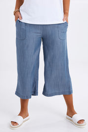 Model Monique wearing size 14 of The Chambray Pull On Cullotes in colour Bluedenim (Blue), from the front, cropped image