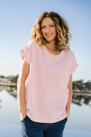 Model Emma wearing size 10 of The Stripe Summer Shell Top in colour Pinkwhite (Pink), from the front, showing the whole outfit