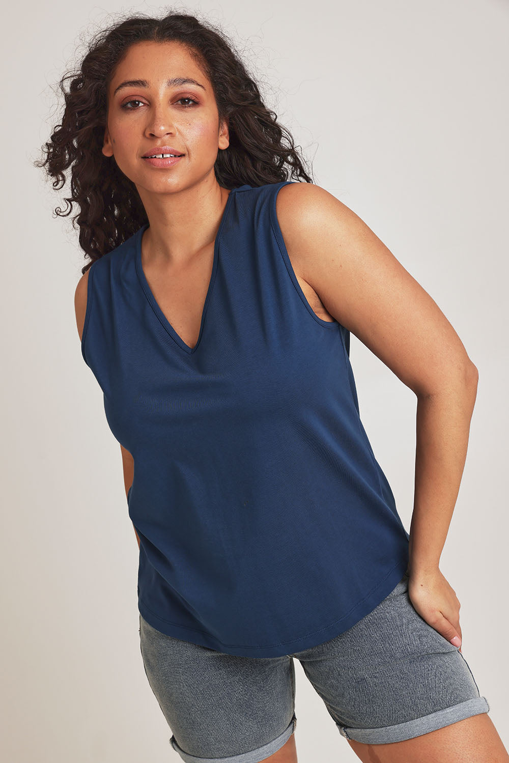 Model Terri-Leigh wearing size 14 of The Keepers Cotton Tank in colour Frenchblue (Blue), from the front, cropped image