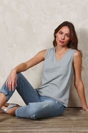 Model Madeline wearing size 10 of The Keepers Cotton Tank in colour Greymarle (Grey), from the front, showing the whole outfit
