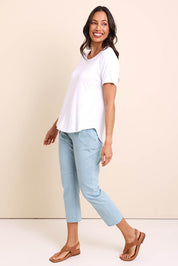 Model Amandam wearing size 10 of the The Bamboo Curved Hem Tee – White in colour White, from the front