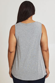 Model Ashleigh wearing size 16 of The Bamboo Crew Neck Swing Tank in colour Greymarle (Grey), from the back