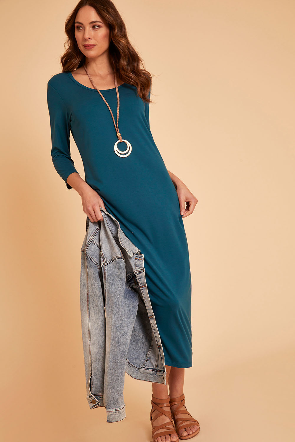 Model Madeline wearing size 10 of The Bamboo 3/4 Sleeve Maxi Dress in colour Blueberry (Blue), from the front, showing the whole outfit