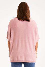 Model Monique wearing size L of The Relaxed V Neck Knit Tee in colour Blushcandy (Pink), from the back