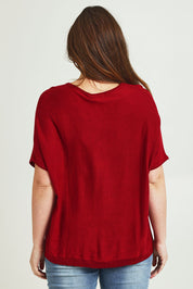 Model Jane wearing size L of The Relaxed V Neck Knit Tee in colour Raspberry (Red), from the back