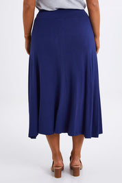 Model Monique wearing size 14 of The Fit & Flare Summer Skirt in colour Royalblue (Blue), from the back