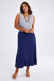 Model Monique wearing size 14 of The Fit & Flare Summer Skirt in colour Royalblue (Blue), from the front, showing the whole outfit