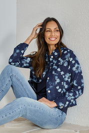 Model Amanda wearing size 10 of The Keepers Printed Denim Jacket in colour Denim (Blue), from the front, showing the whole outfit