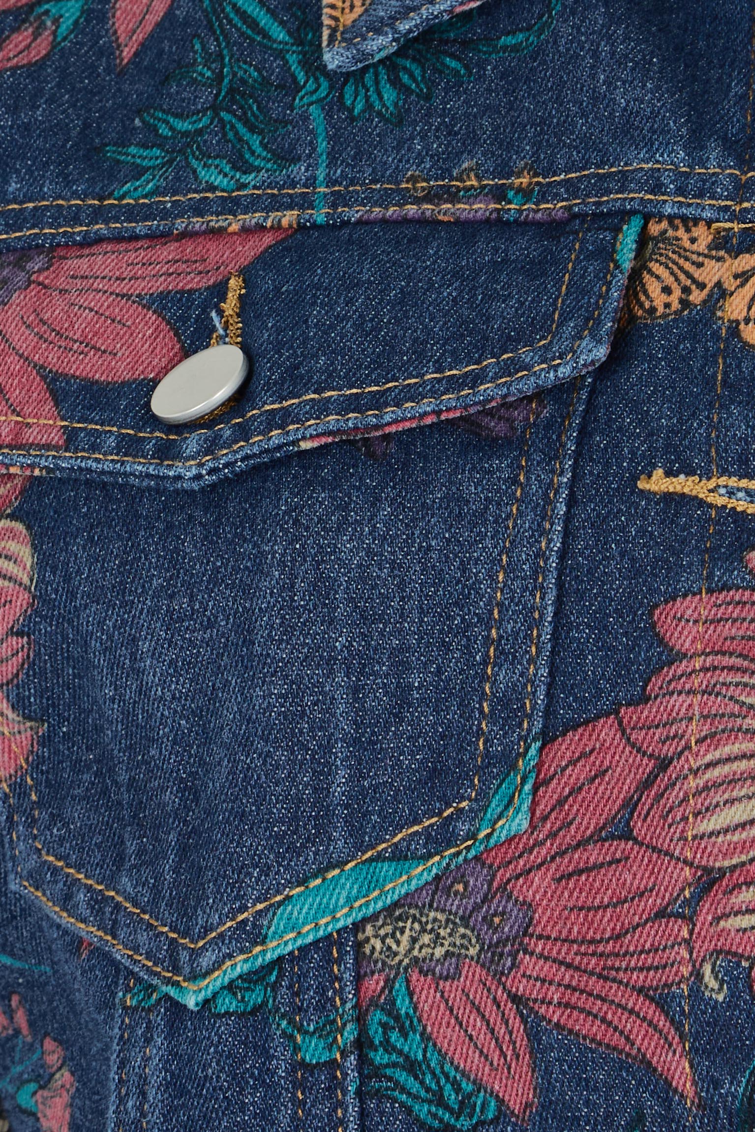 Product shot of The Keepers Printed Denim Jacket in colour Redfloral (Blue), detail