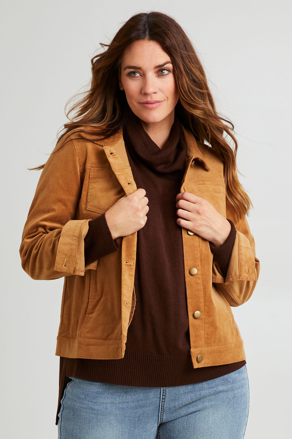 Model Laura wearing size 14 of The Keepers Cord Jacket in colour Camel, from the front, cropped image