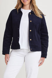 Model Chanel wearing size 16 of The Keepers Cord Jacket in colour Darknavy (Blue), from the front, cropped image