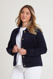 Model Chanel wearing size 16 of The Keepers Cord Jacket in colour Darknavy (Blue), from the front, cropped image