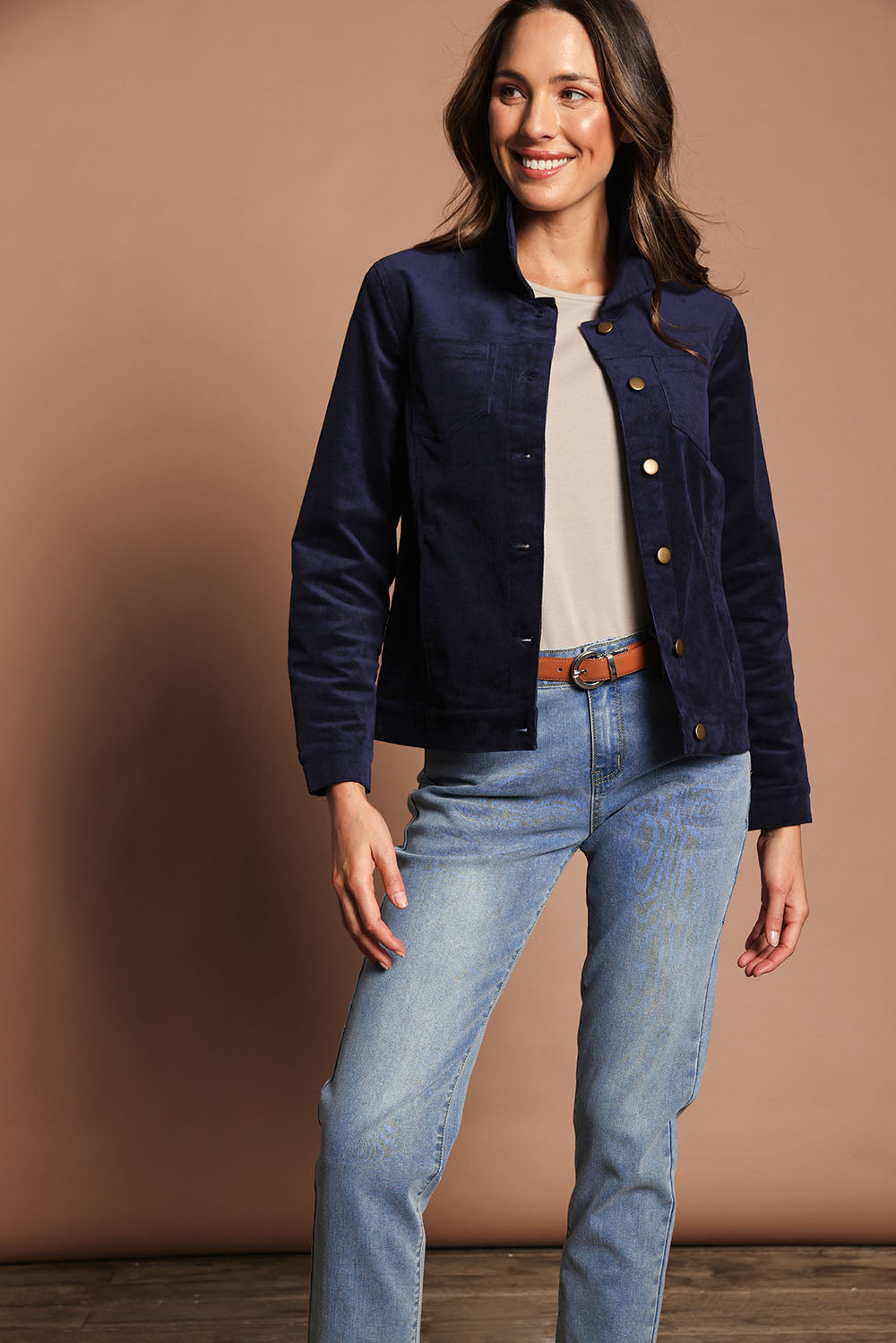 Model Madeline wearing size 10 of The Keepers Cord Jacket in colour Darknavy (Blue), from the front, showing the whole outfit