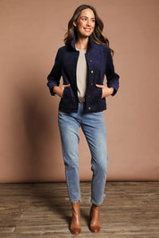 Model Madeline wearing size 10 of The Keepers Cord Jacket in colour Darknavy (Blue), from the front, showing the whole outfit