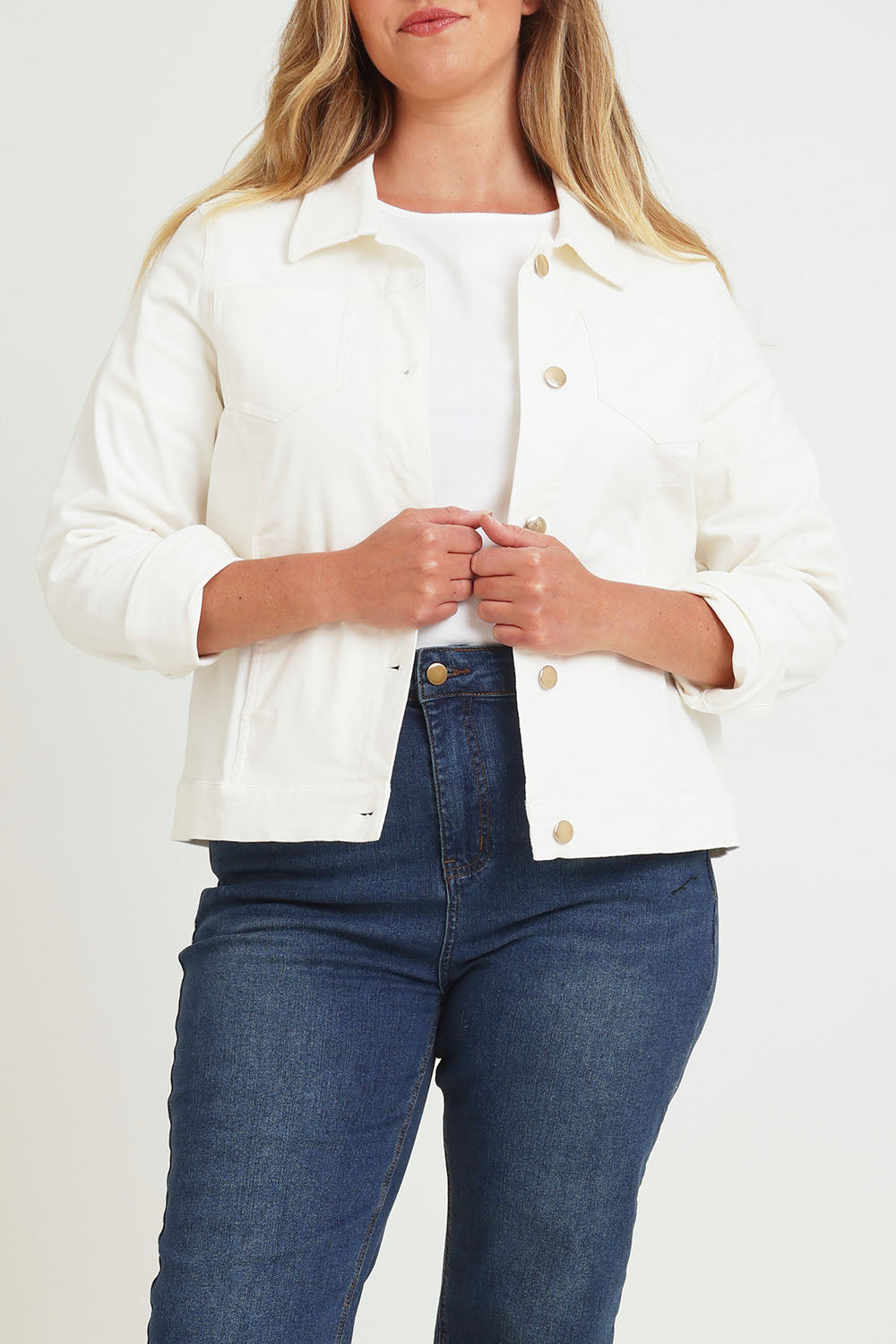 Model Chanel wearing size 16 of The Keepers Cord Jacket in colour Wintersnow (White), from the front, cropped image