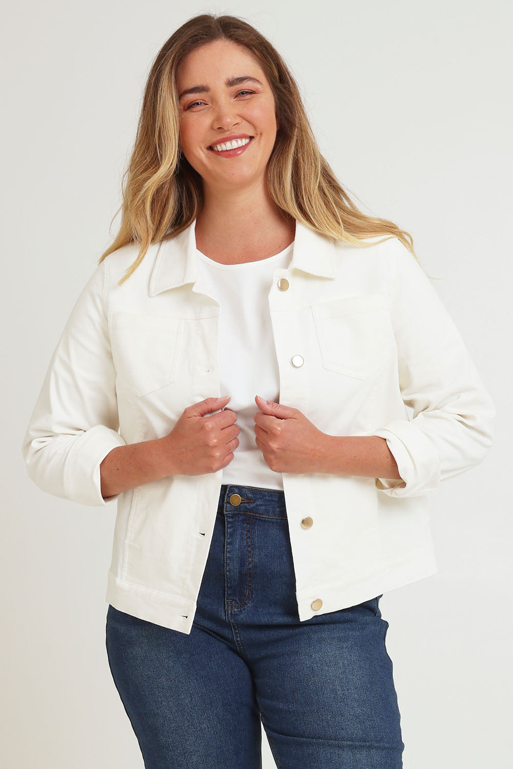 Model Chanel wearing size 16 of The Keepers Cord Jacket in colour Wintersnow (White), from the front, cropped image