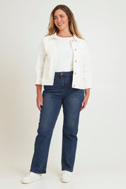 Model Chanel wearing size 16 of The Keepers Cord Jacket in colour Wintersnow (White), from the front, showing the whole outfit