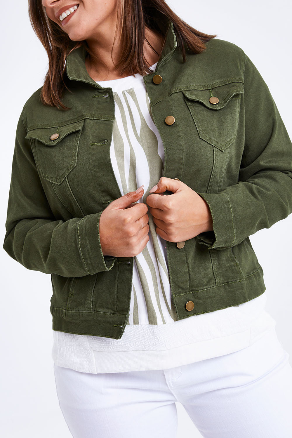 Model Monique wearing size 14 of The Slim Fit Denim Jacket in colour Khaki (Green), from the front, cropped image