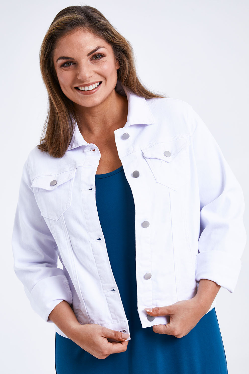 Model Monique wearing size 14 of The Slim Fit Denim Jacket in colour White (White), from the front, cropped image