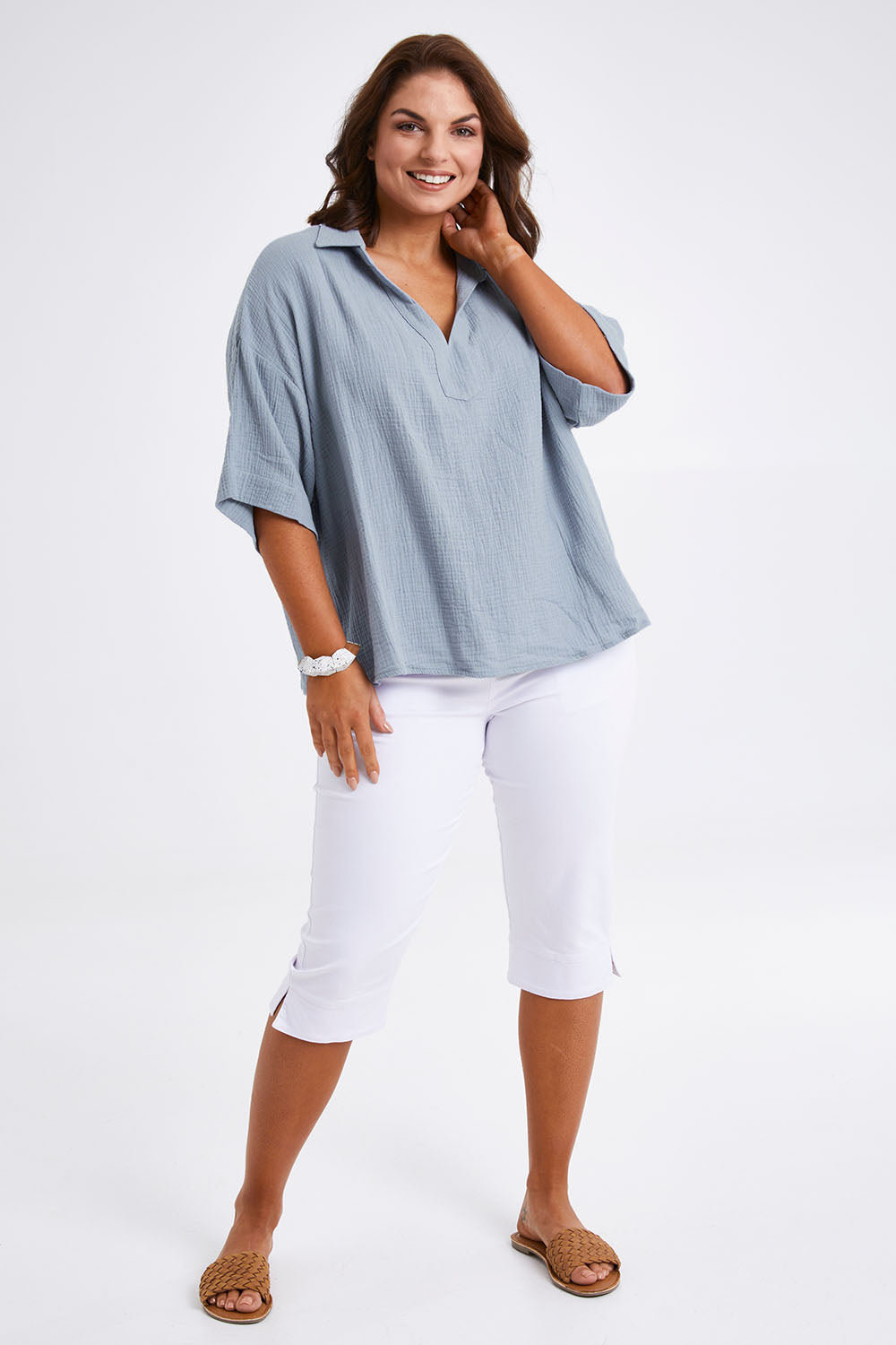 Model Monique wearing size 14 of The Double Cotton Collar Top in colour Chambray (Blue), from the front, showing the whole outfit