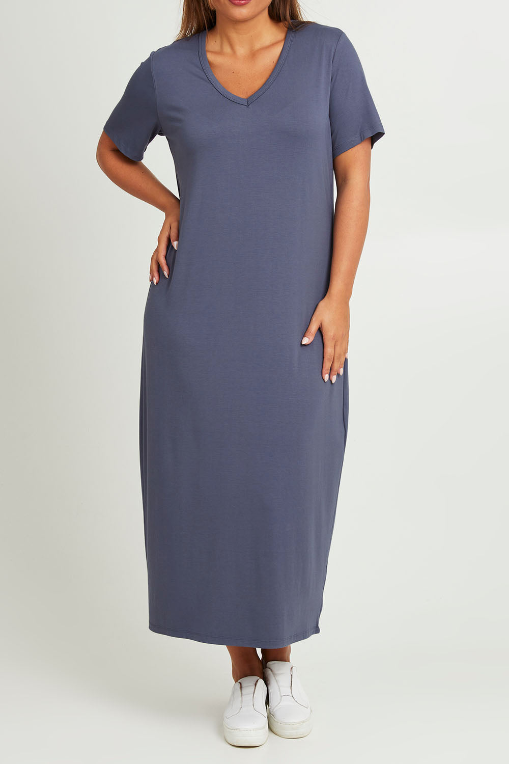 Model Monique wearing size 14 of The V Neck Bamboo Maxi Dress in colour Dustyblue (Blue), from the front, cropped image